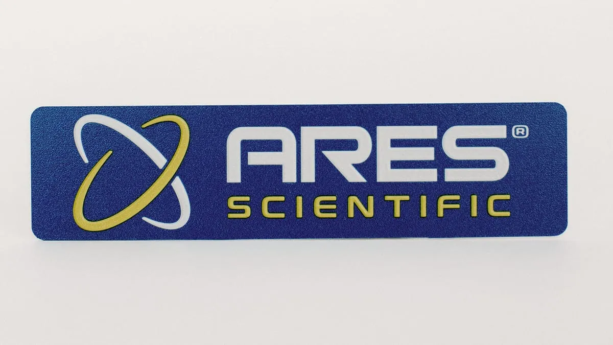 Two blue ARES Scientific digitally printed nameplates