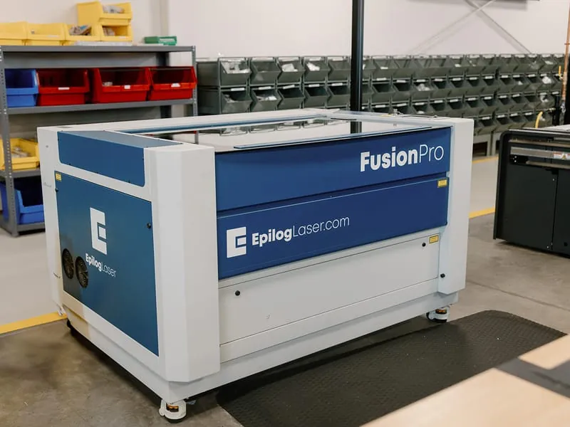 The Epilog FusionPro laser engraver on the production floor